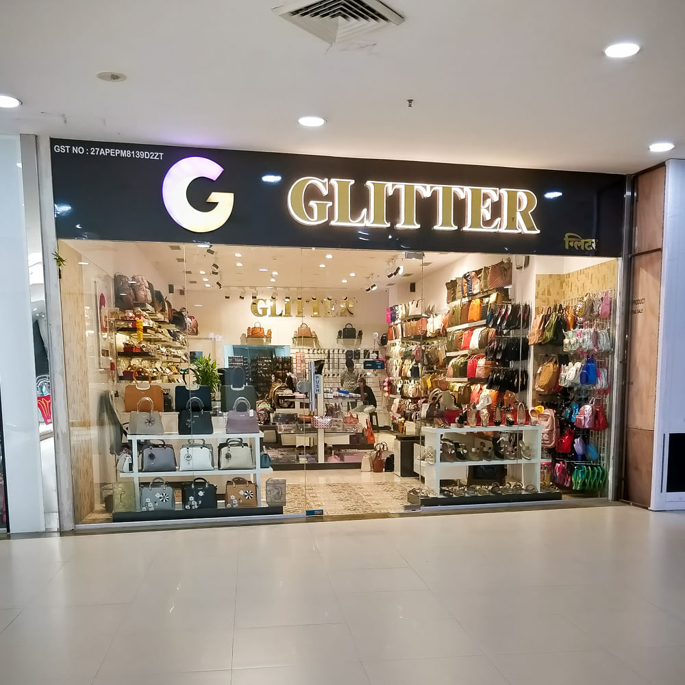 Outlet store,Building,Retail,Shopping mall,Boutique,Footwear,Interior design,Shopping,Fashion accessory,Shoe