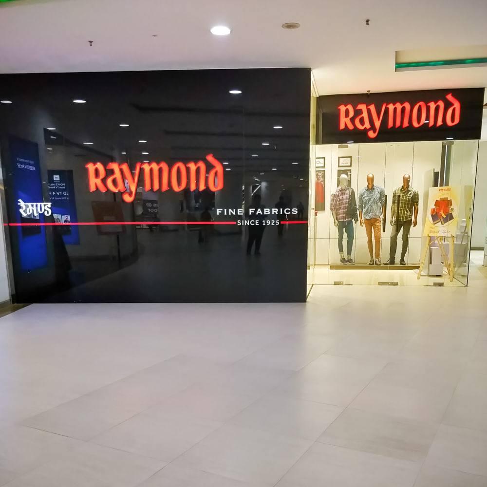 Building,Advertising,Display advertising,Shopping mall,Floor,Interior design,Signage,Flooring,Brand,Retail