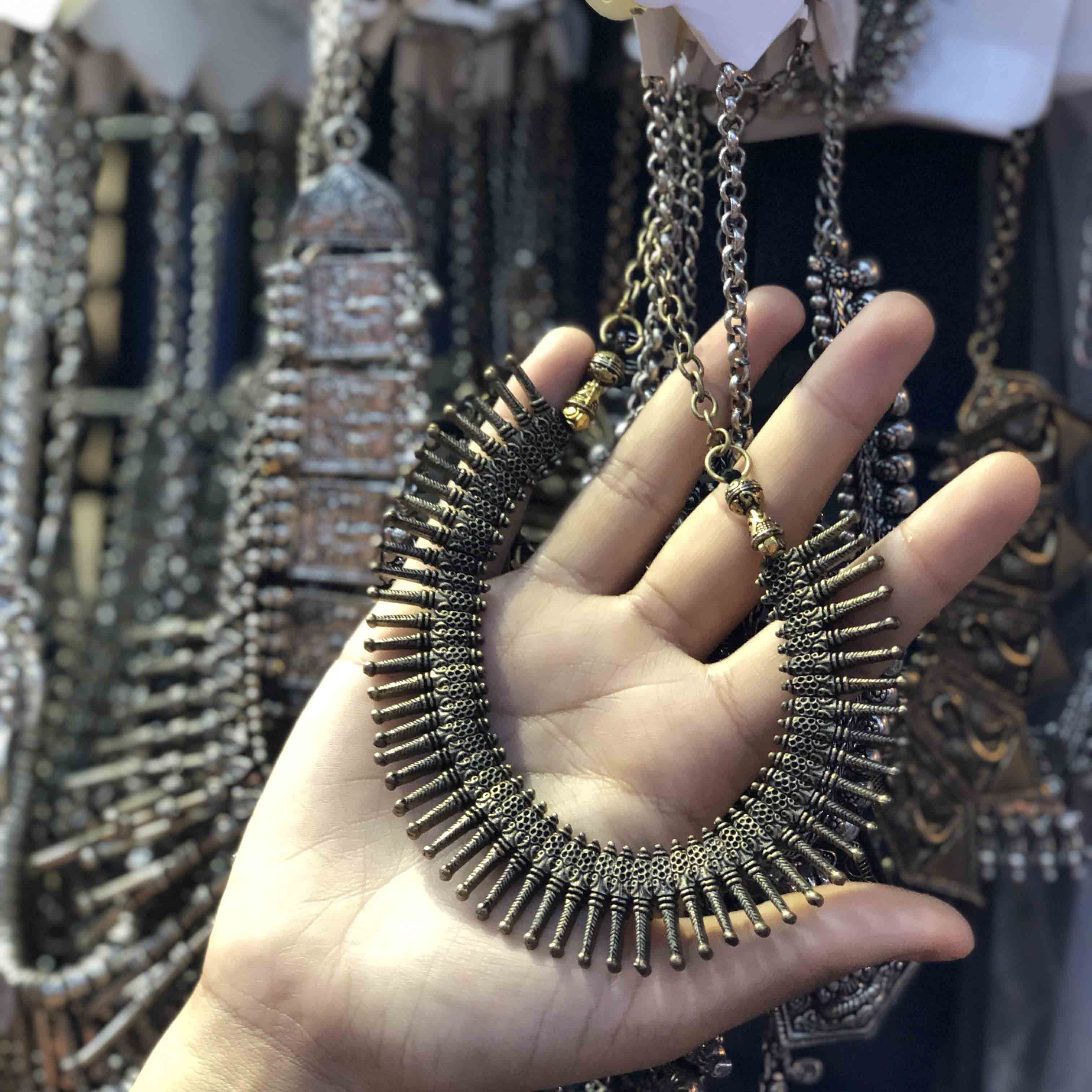 Necklace,Jewellery,Fashion accessory,Fashion,Hand,Metal,Chain,Neck,Finger,Ear