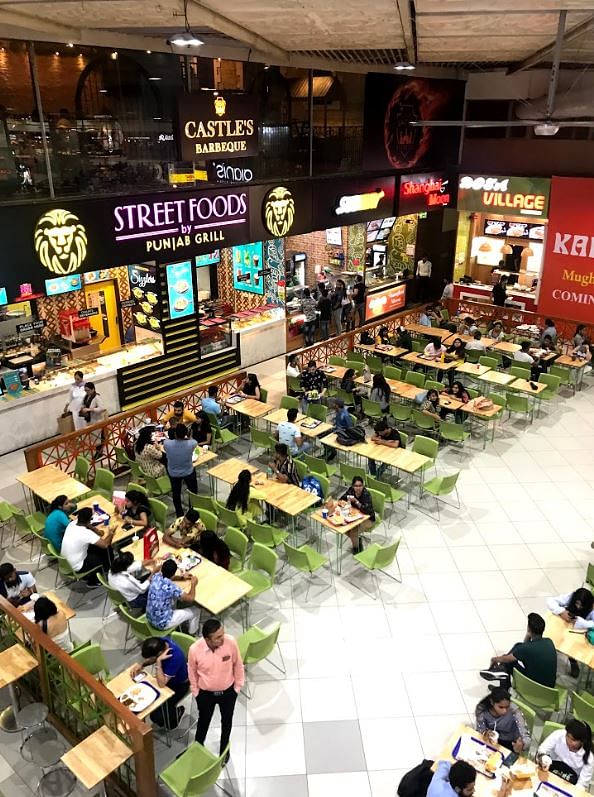 Crowd,Shopping mall,Building,Food court,Event,Marketplace,City,Shopping,Retail,Leisure
