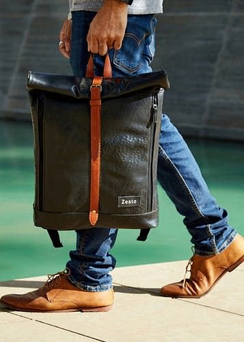 Footwear,Leather,Jeans,Baggage,Human,Leg,Denim,Street fashion,Shoe,Satchel