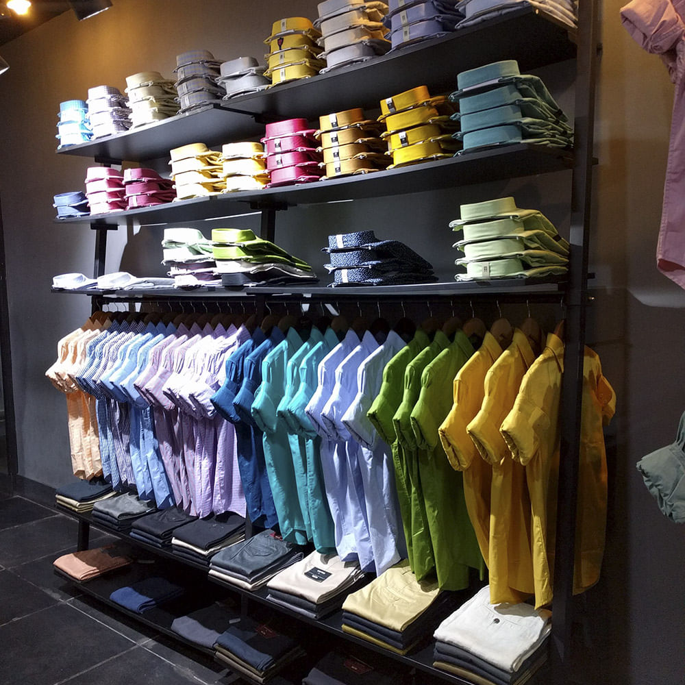 Outlet store,Footwear,Shelf,Room,Furniture,Shoe,Shelving