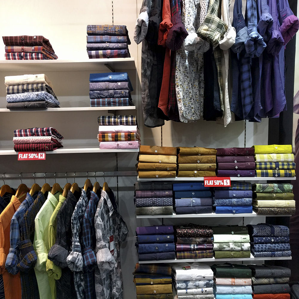 Clothing,Outlet store,Room,Closet,Textile,Boutique,Collection,Wardrobe,Clothes hanger,Dress shirt