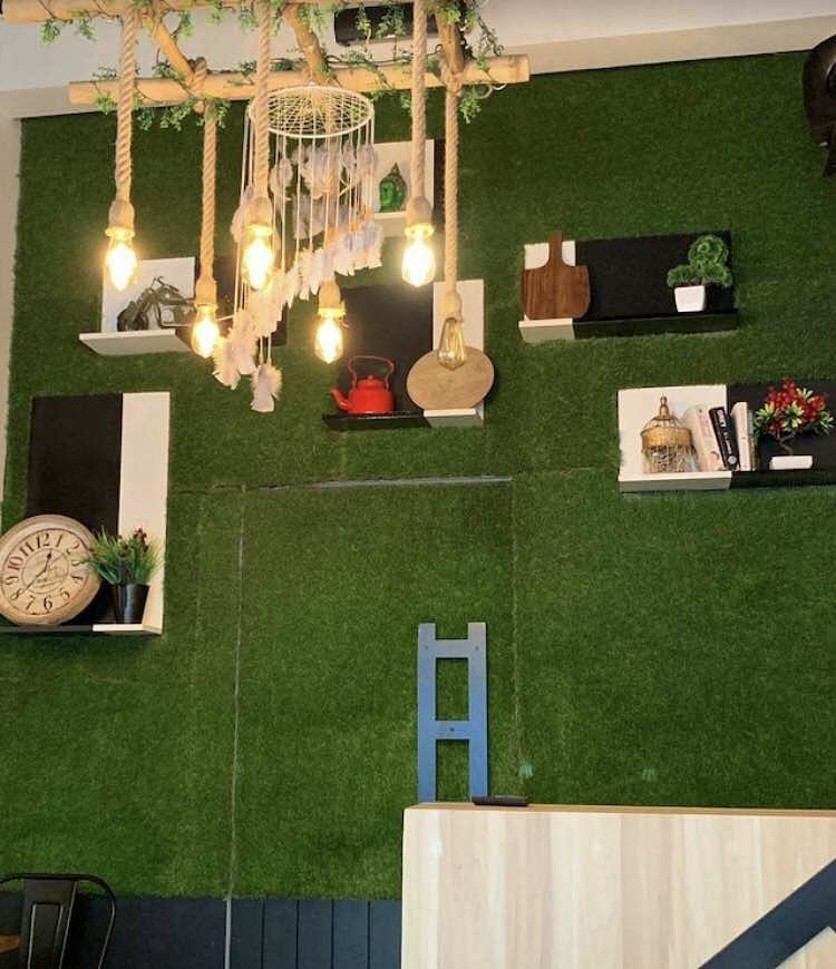 Grass,Scale model,Room,House,Artificial turf,Interior design,Table,Backyard,Lawn,Flooring