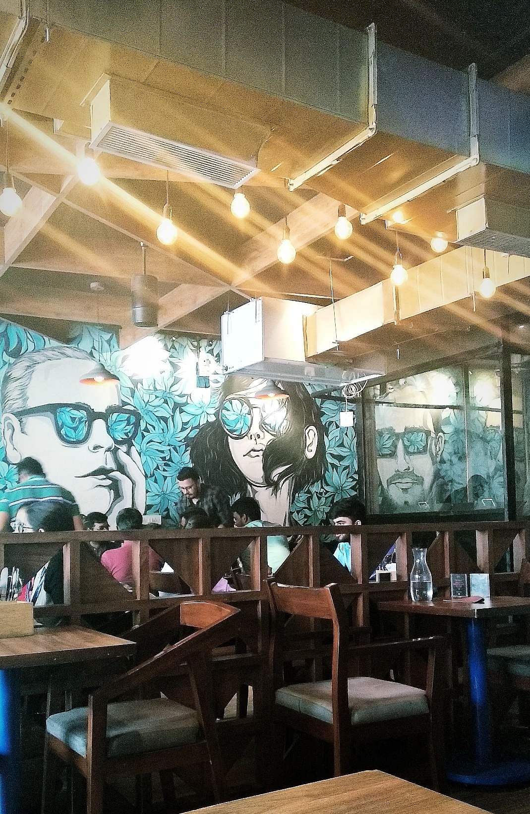 Ceiling,Interior design,Building,Room,Design,Table,Restaurant,Architecture,Furniture