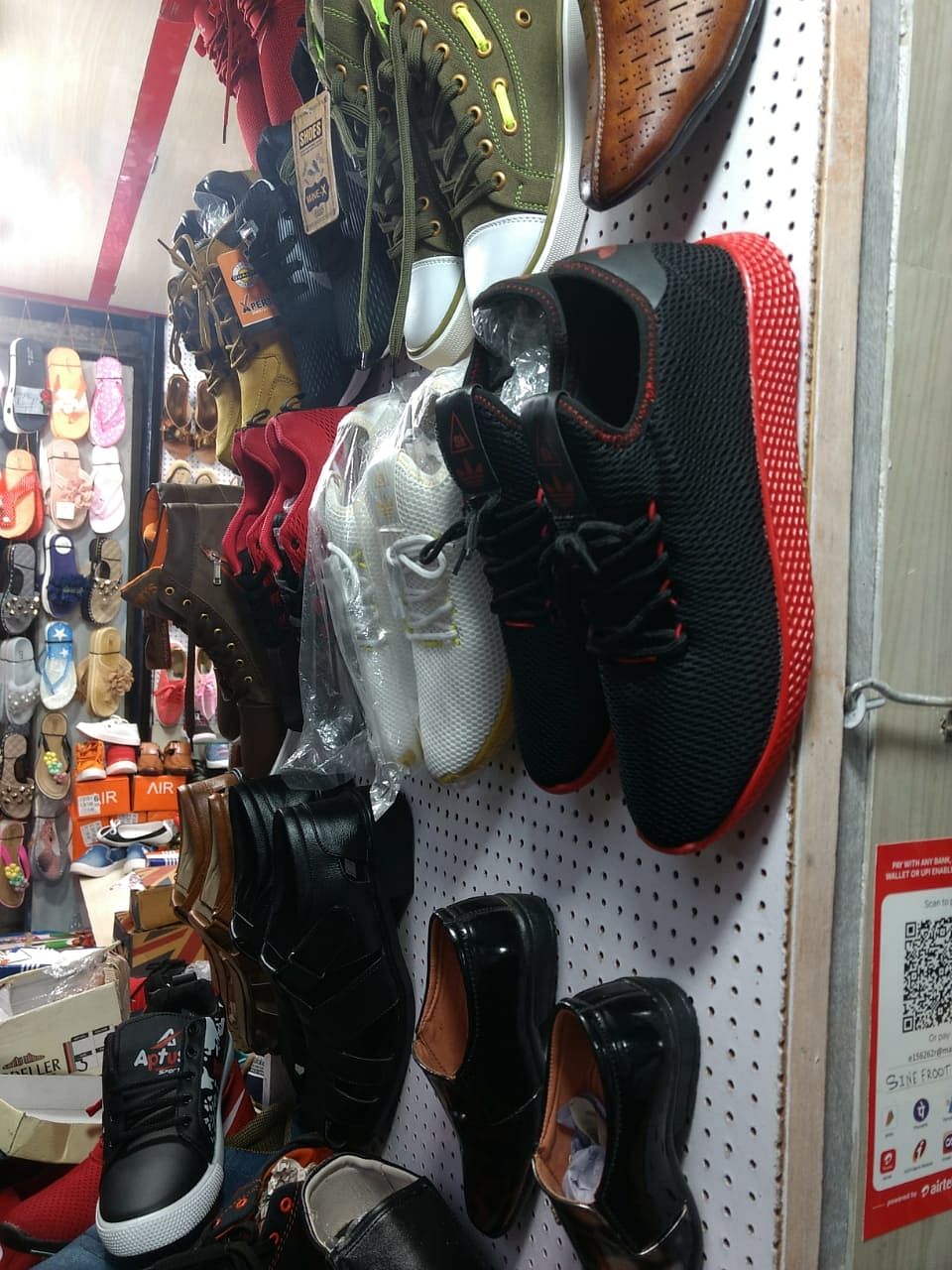 Footwear,Shoe,Personal protective equipment,Room,Retail,Carmine,Boot,Ski boot