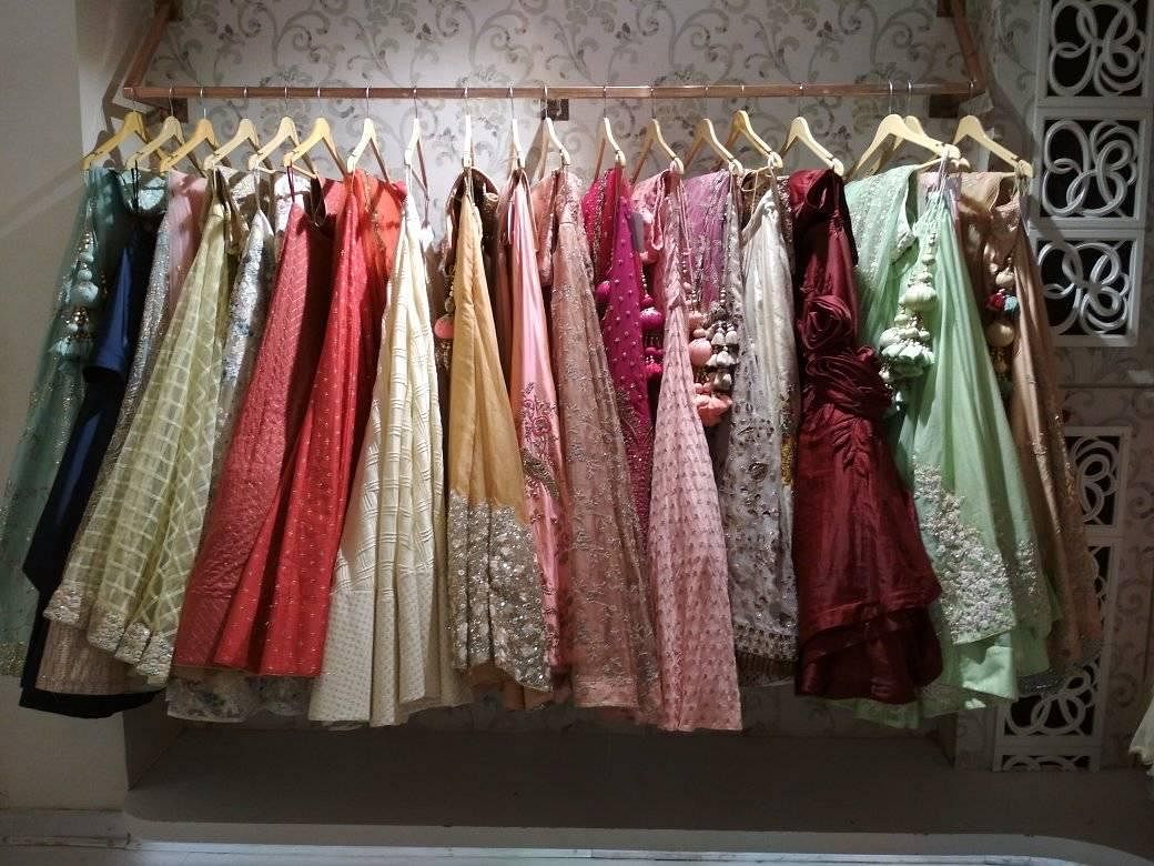 Clothing,Boutique,Room,Textile,Dress,Clothes hanger,Closet,Fashion design