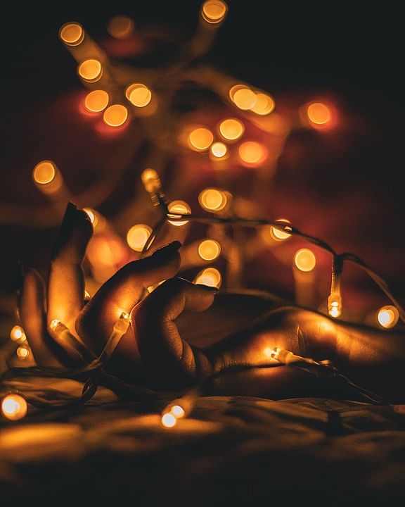 Light,Lighting,Heat,Tree,Sky,Candle,Still life photography,Night,Plant,Interior design