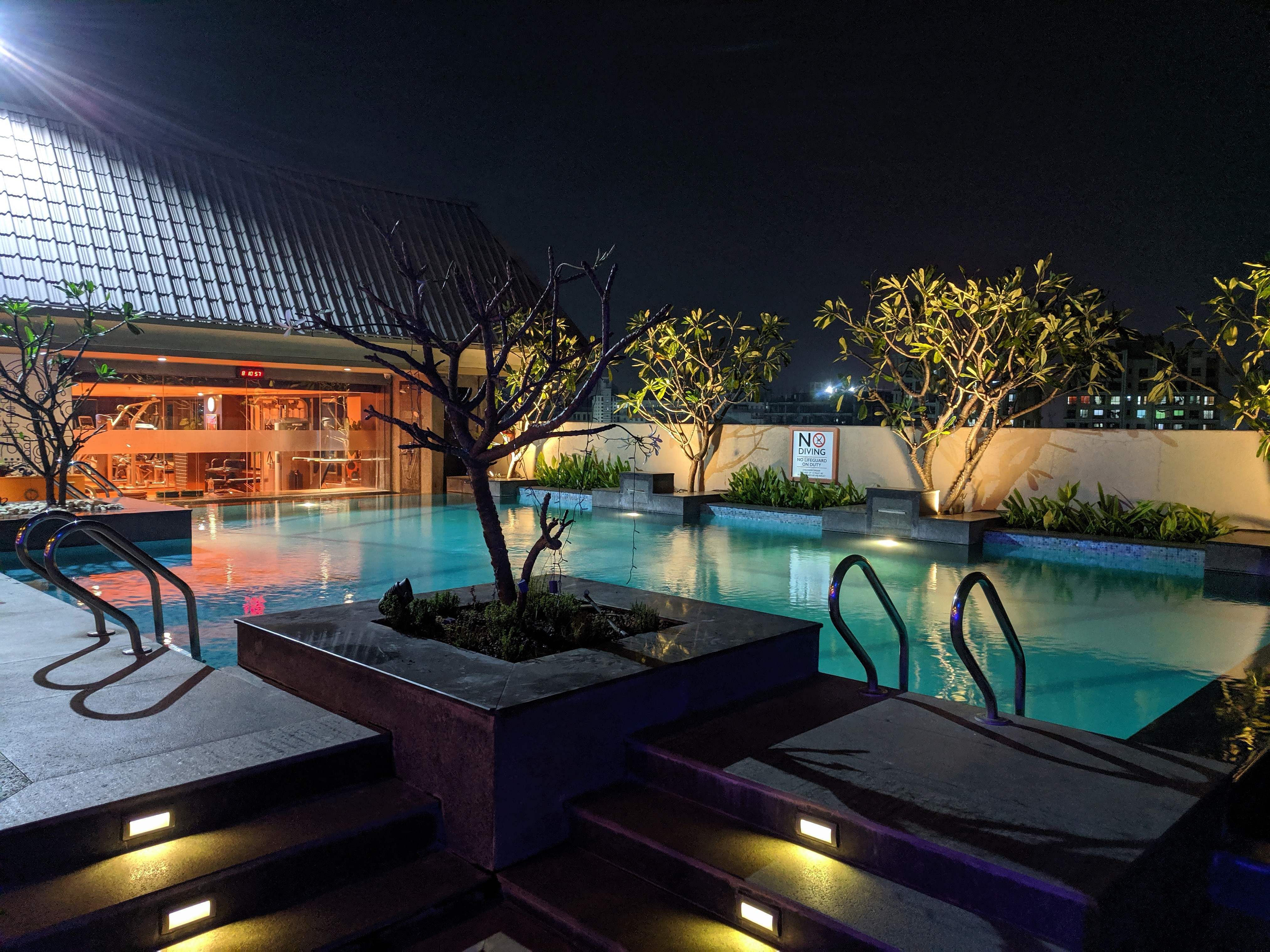 Swimming pool,Property,Lighting,Resort,Sky,Building,Home,Architecture,Leisure,House