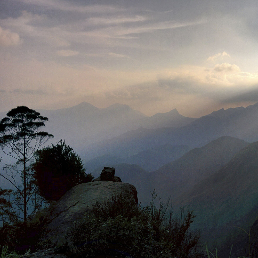 Sky,Natural landscape,Atmospheric phenomenon,Mountainous landforms,Mountain,Cloud,Morning,Hill station,Hill,Atmosphere