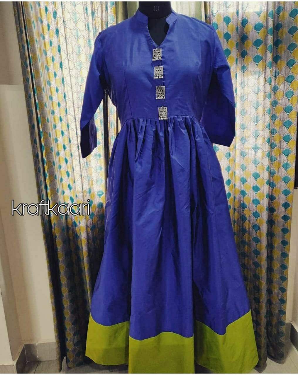 Clothing,Blue,Purple,Cobalt blue,Formal wear,Yellow,Dress,Sleeve,Electric blue,Textile