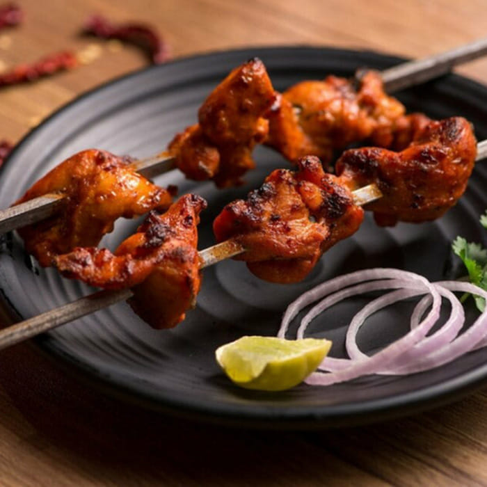 Dish,Cuisine,Food,Ingredient,Fried food,Tandoori chicken,Chicken meat,Chicken 65,Yakitori,Meat