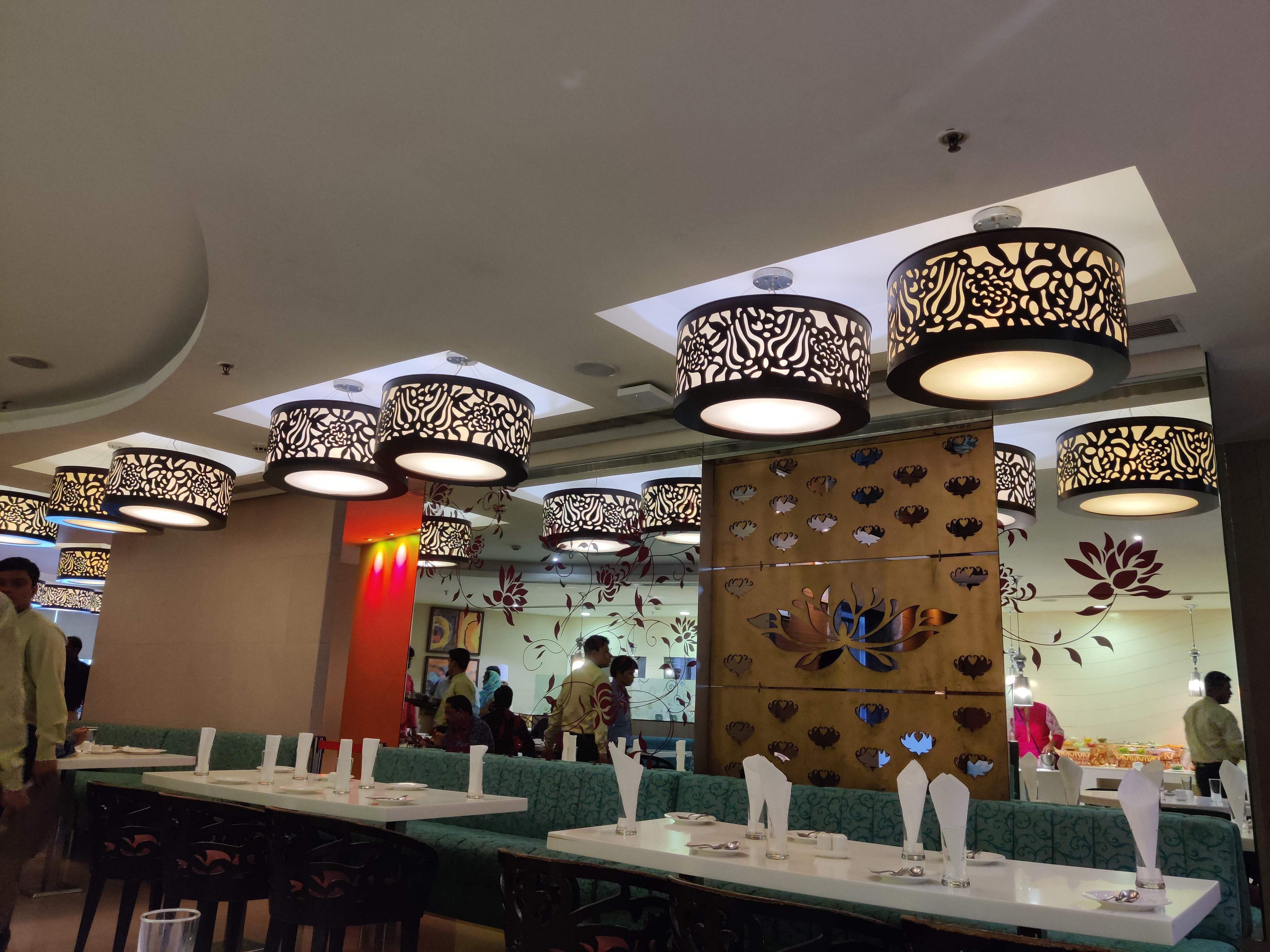 Ceiling,Interior design,Building,Lighting,Restaurant,Room,Architecture,Lighting accessory,Light fixture