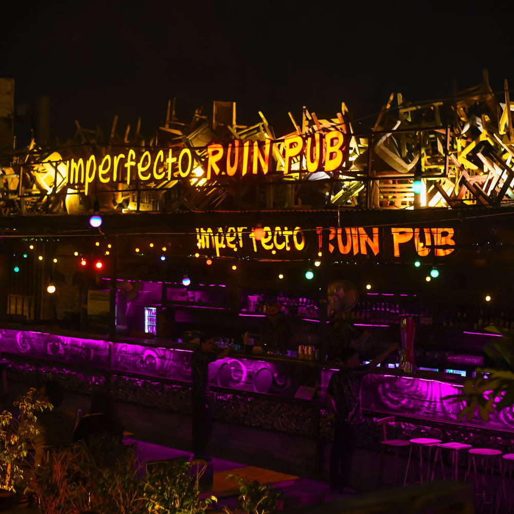 Lighting,Night,Neon,Purple,Neon sign,Electronic signage,Midnight,Font,Architecture,Metropolis