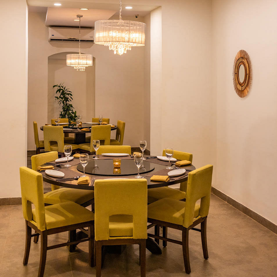 Dining room,Room,Yellow,Furniture,Interior design,Table,Property,Building,Kitchen & dining room table,Ceiling