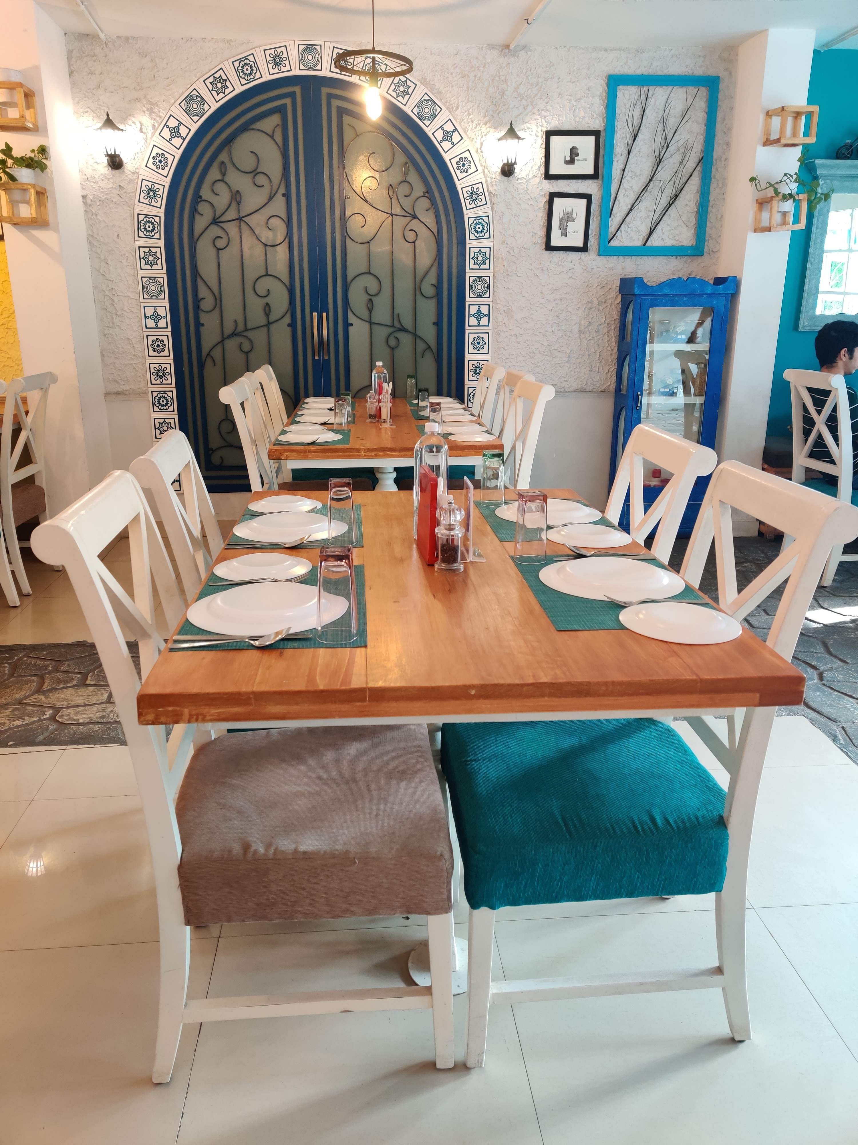 Furniture,Room,Table,Interior design,Blue,Dining room,Turquoise,Chair,Design,Building