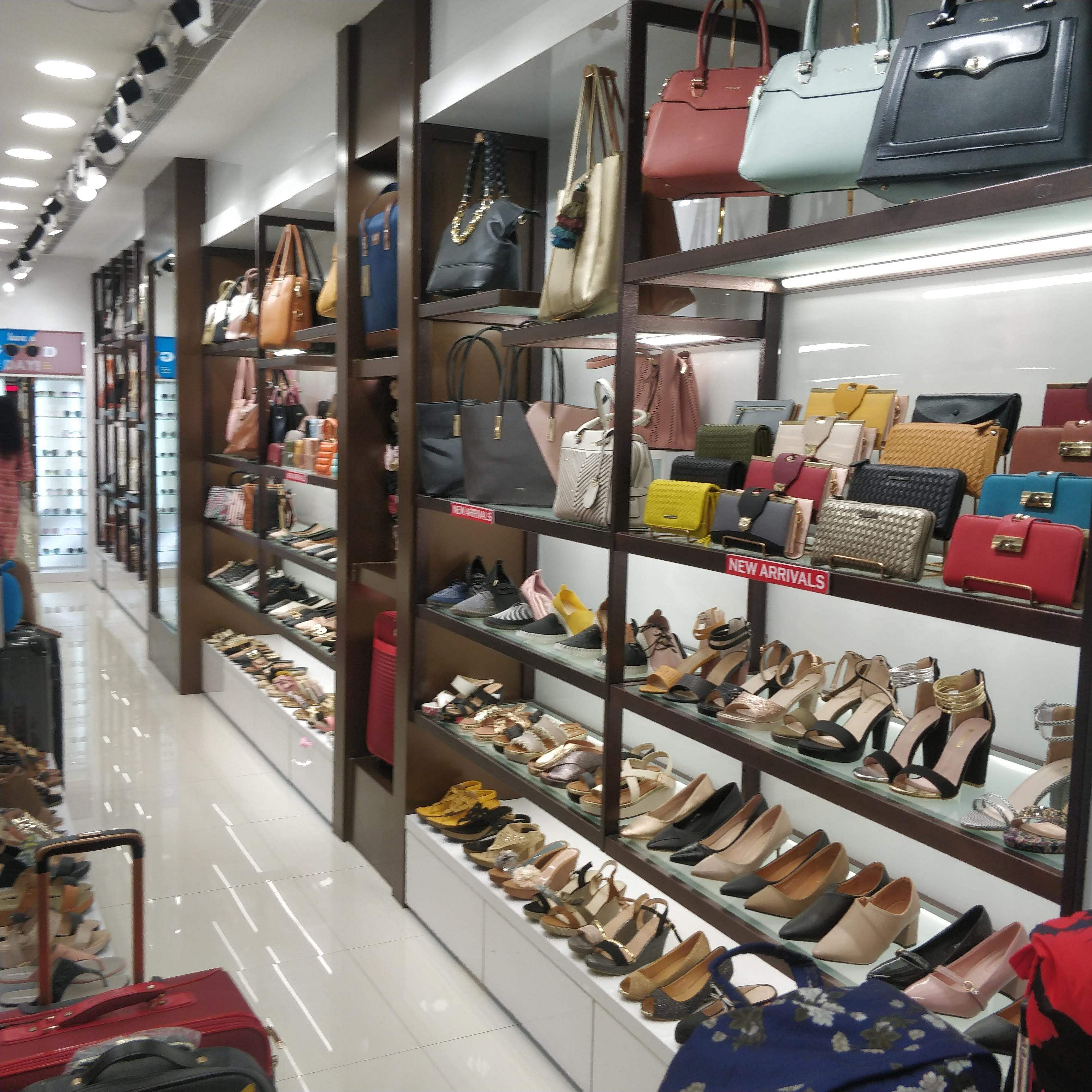 Outlet store,Building,Footwear,Retail,Inventory,Shoe store,Collection,Shoe,Interior design,Display case