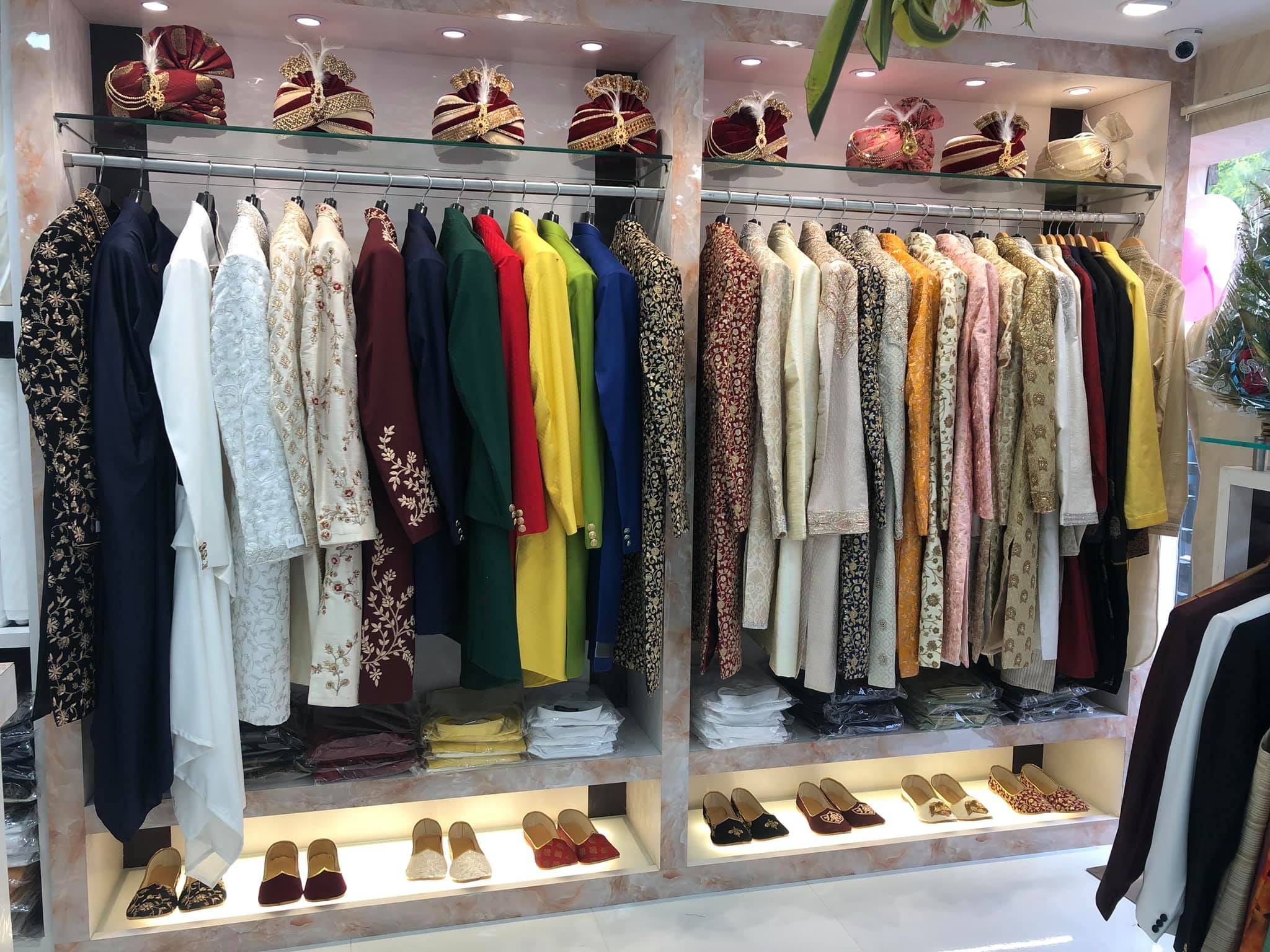 Boutique,Closet,Room,Clothing,Clothes hanger,Outlet store,Furniture,Wardrobe,Interior design,Metal