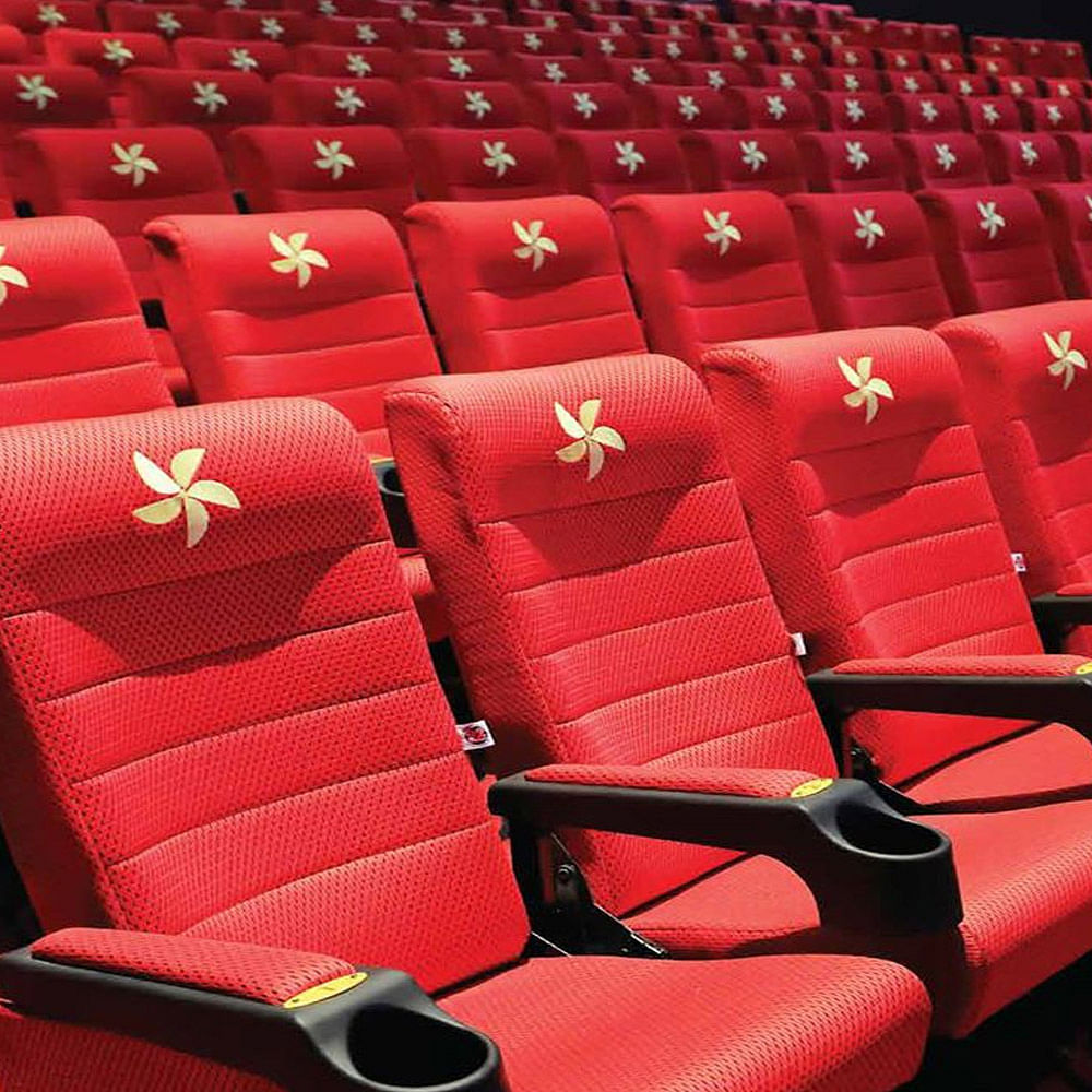 Red,Auditorium,Car seat,Vehicle,Carmine,Car,Car seat cover,Stadium,Theatre,Plant