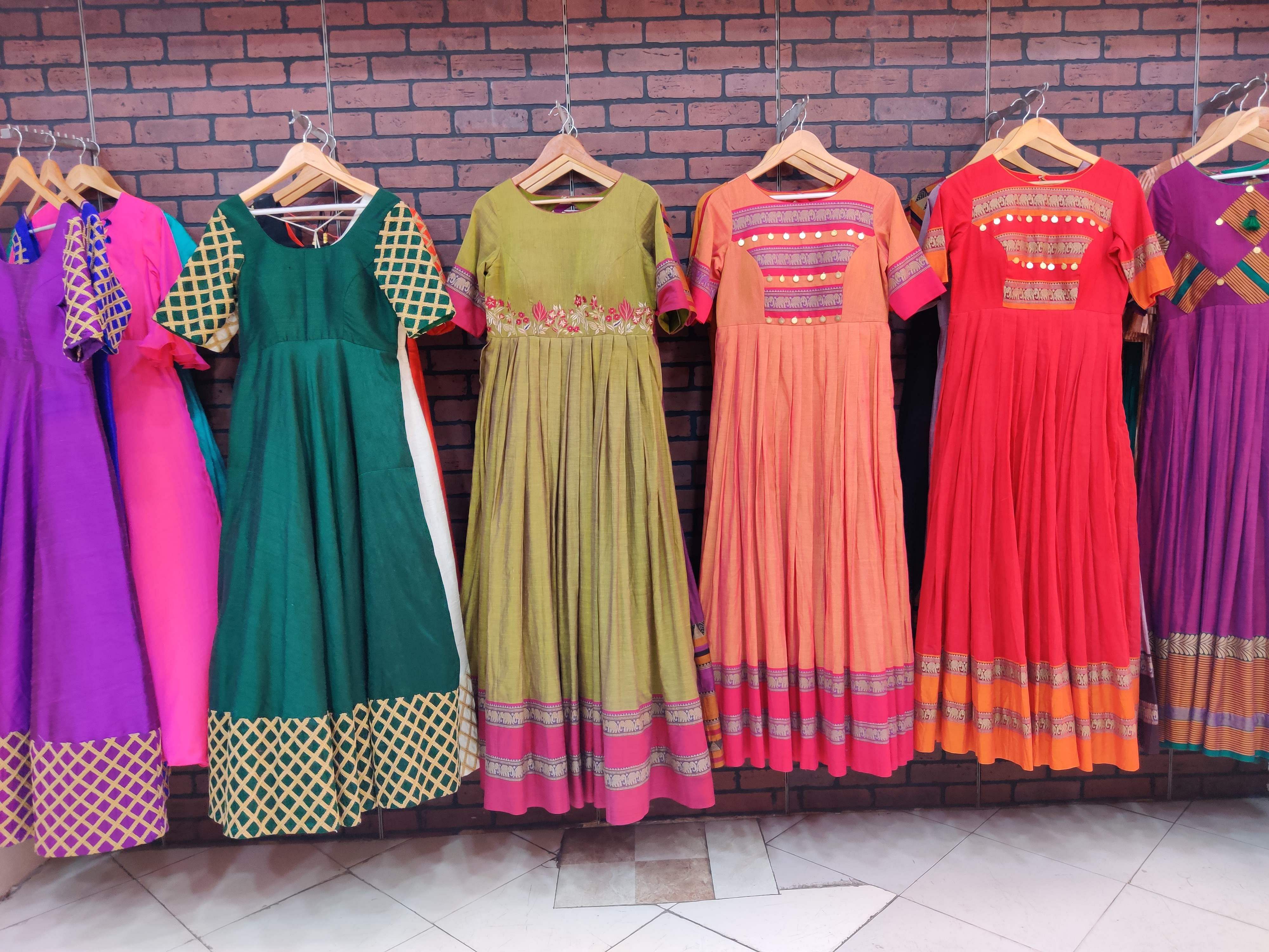Clothing,Dress,Pink,Day dress,Boutique,Yellow,Formal wear,Fashion,Fashion design,Sleeveless shirt