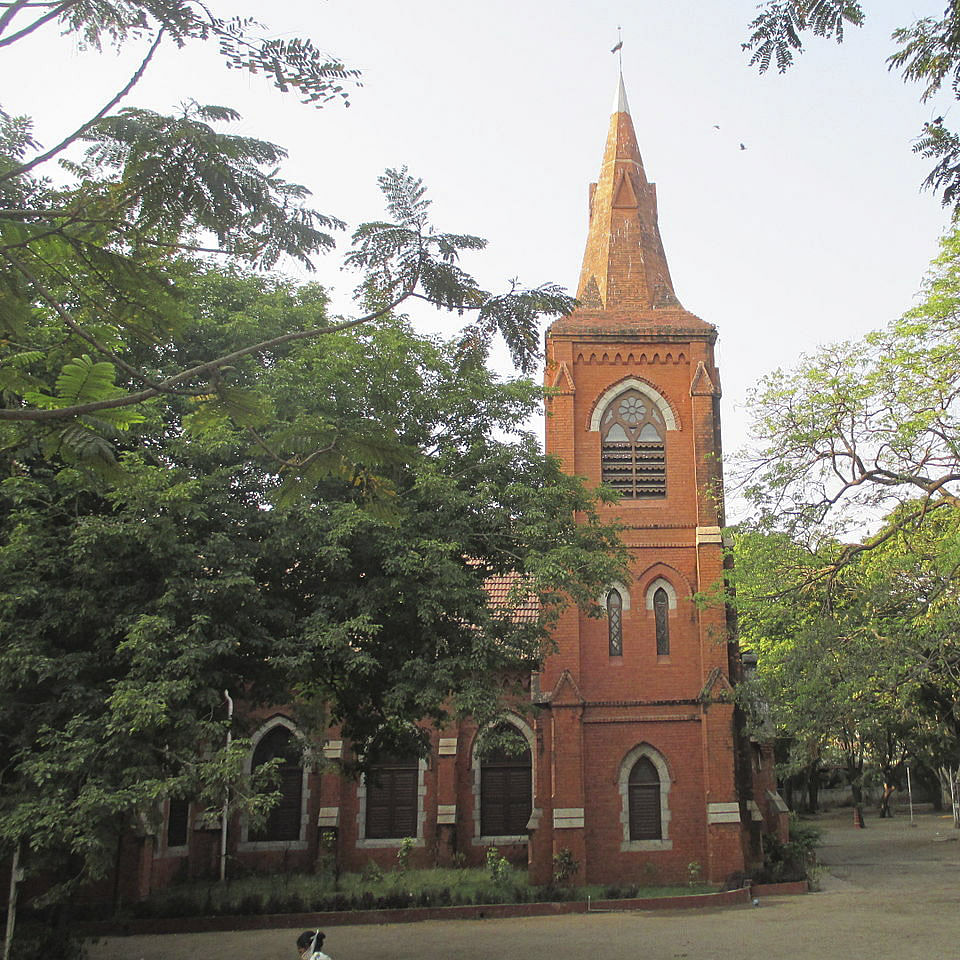 Steeple,Spire,Landmark,Tower,Church,Building,Place of worship,Architecture,Tree,Chapel