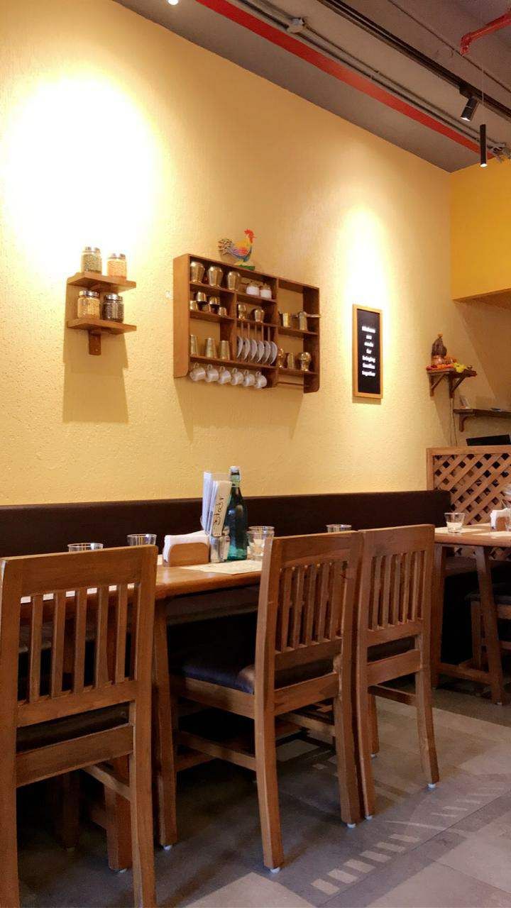 Room,Furniture,Table,Building,Interior design,Restaurant,Café,Kitchen & dining room table,House,Dining room