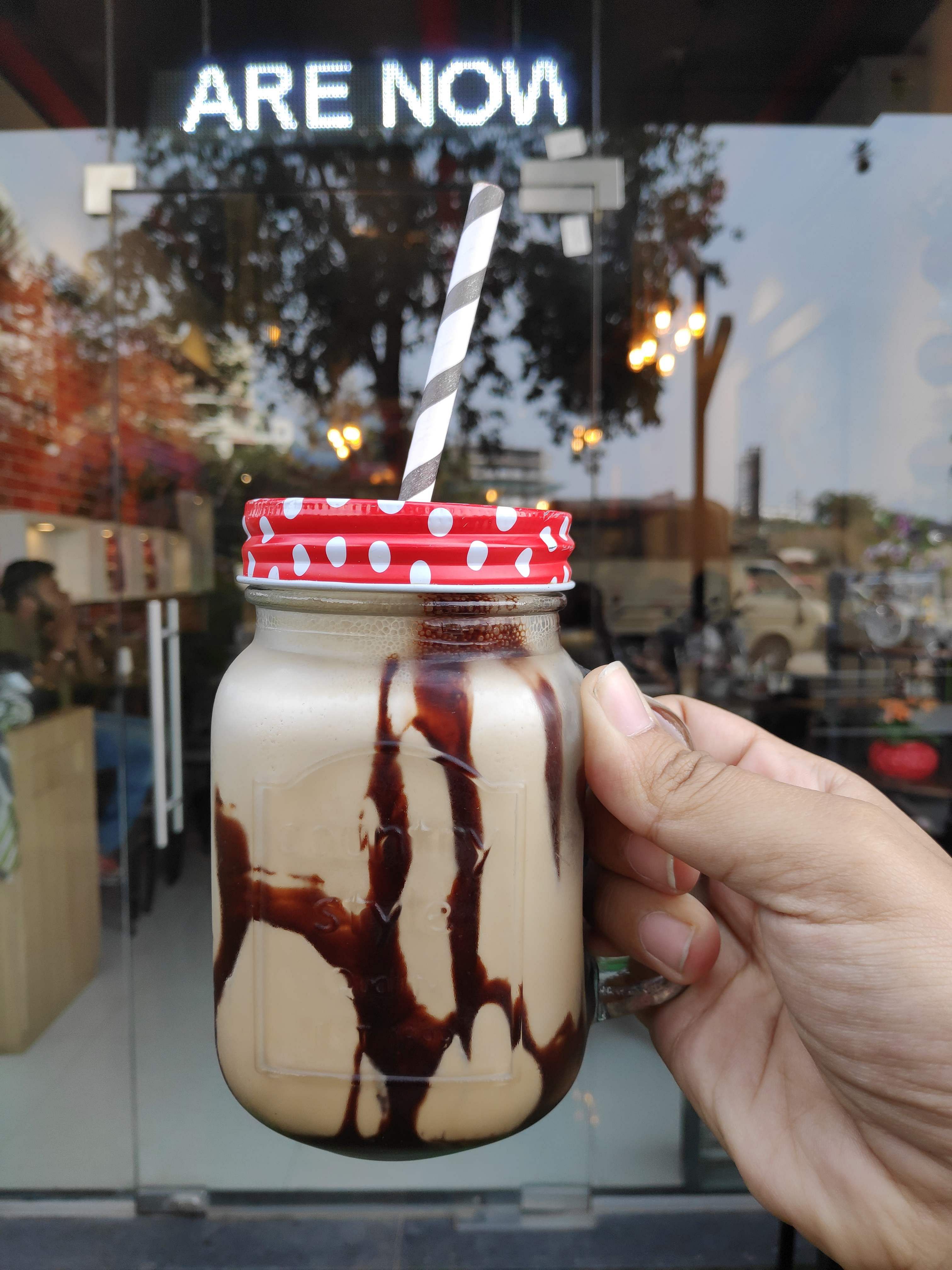 Mason jar,Hand,Food,Dairy,Dessert