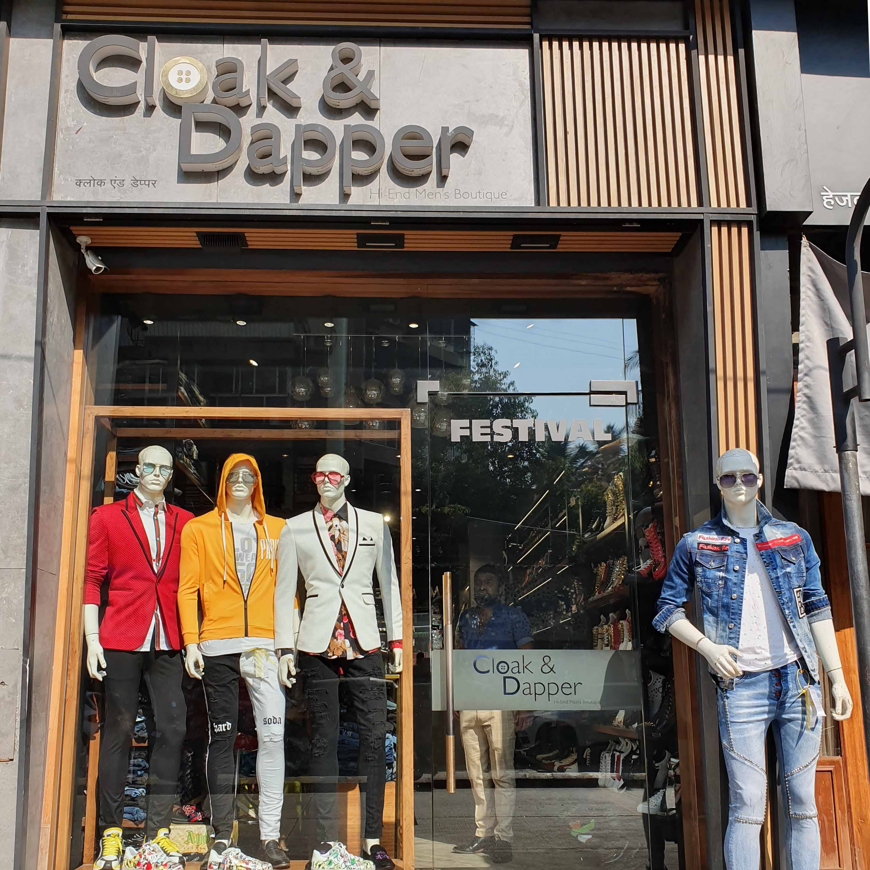 Display window,Standing,Tourism,Window,Jeans,Textile,Facade,Door,Building,Street