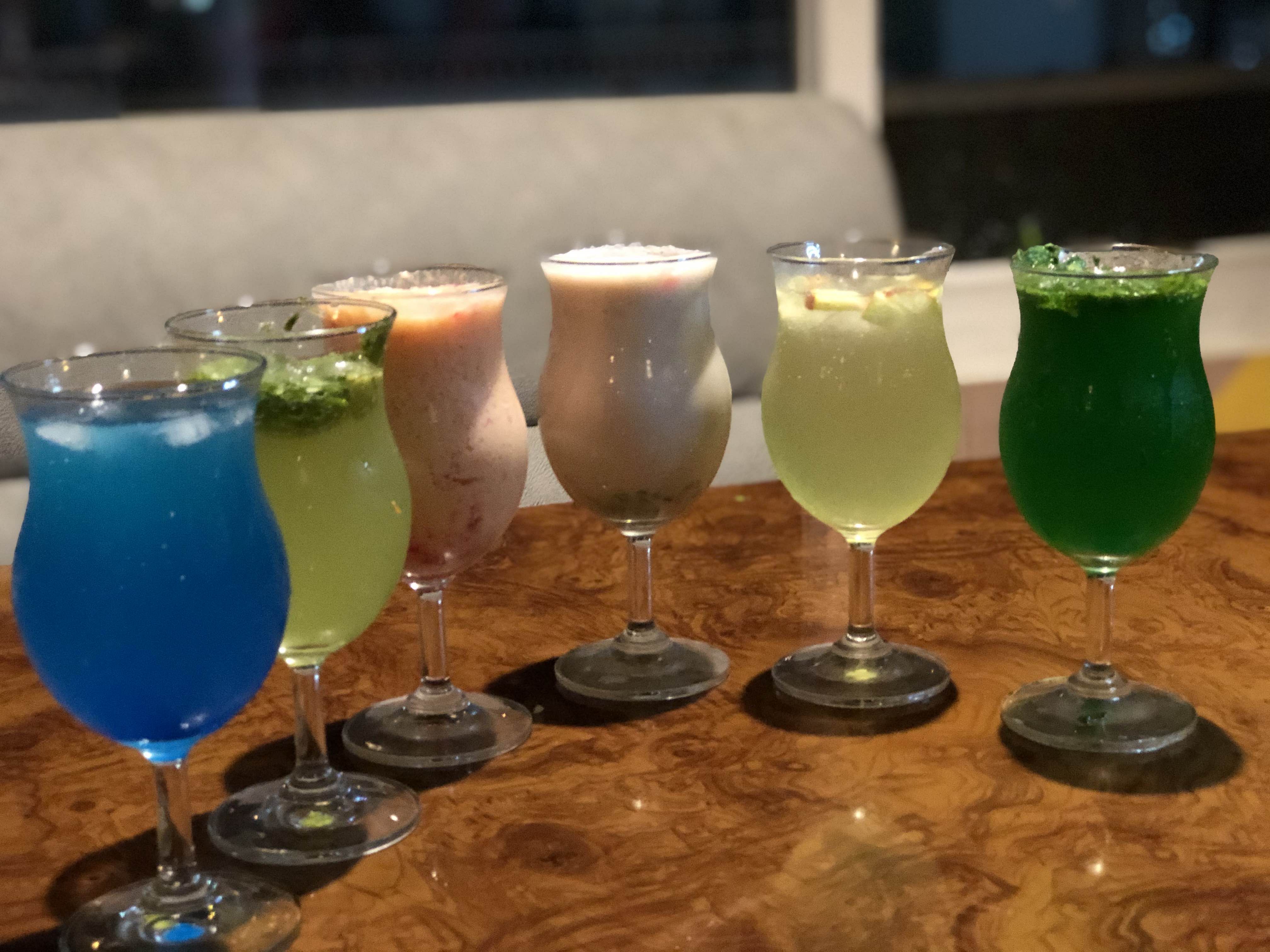 Drink,Alcoholic beverage,Distilled beverage,Cocktail,Non-alcoholic beverage,Classic cocktail,Champagne cocktail,Liqueur,Juice,Cocktail garnish