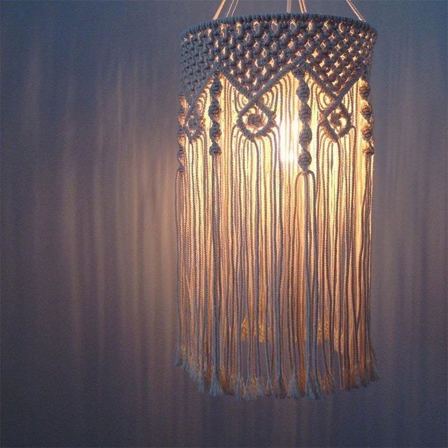 Light fixture,Lighting,Chandelier,Light,Ceiling fixture,Ceiling,Lighting accessory,Lamp,Interior design,Room