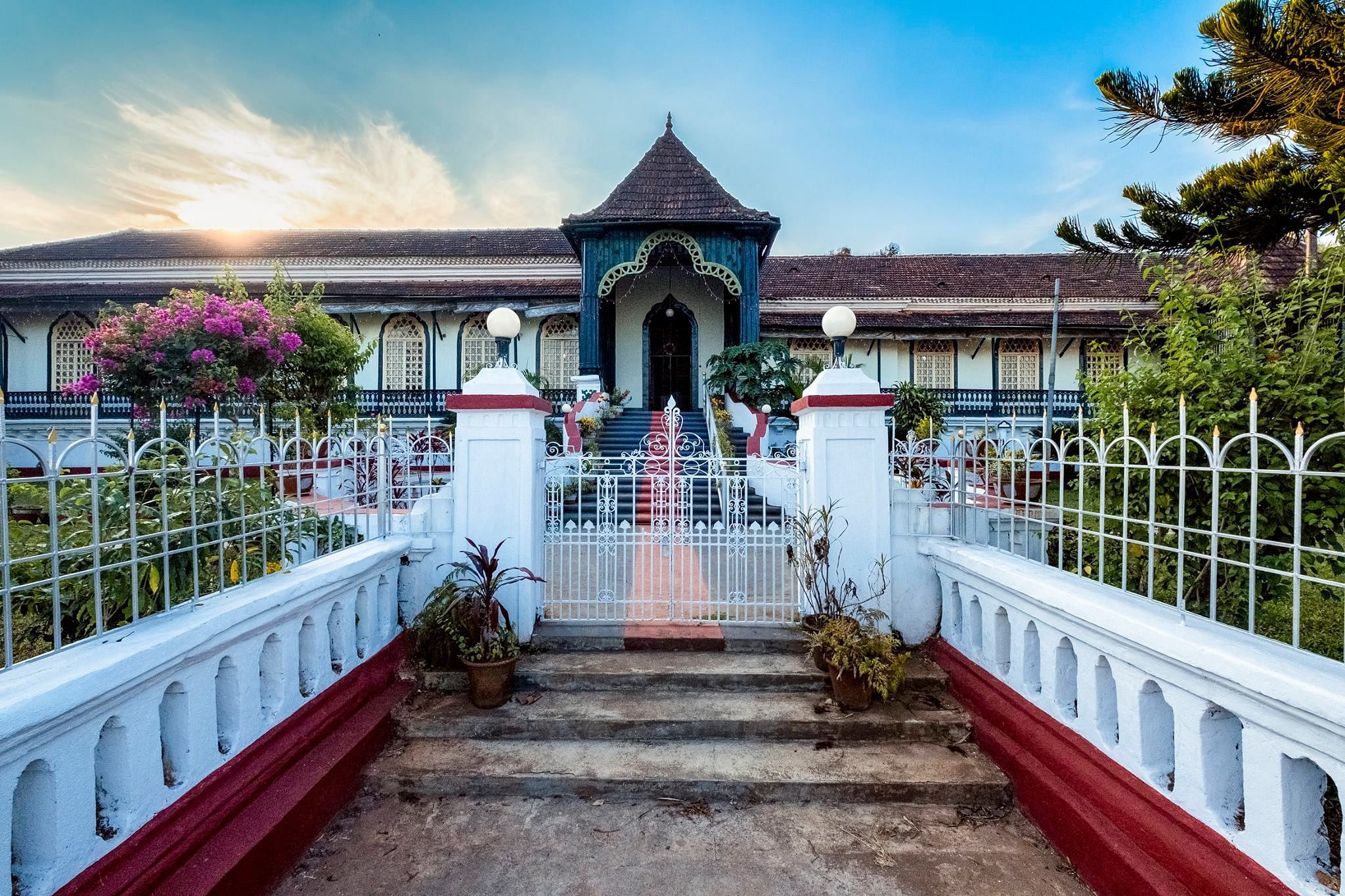 Building,Sky,Property,Architecture,House,Tree,Home,Real estate,Tourism,Temple