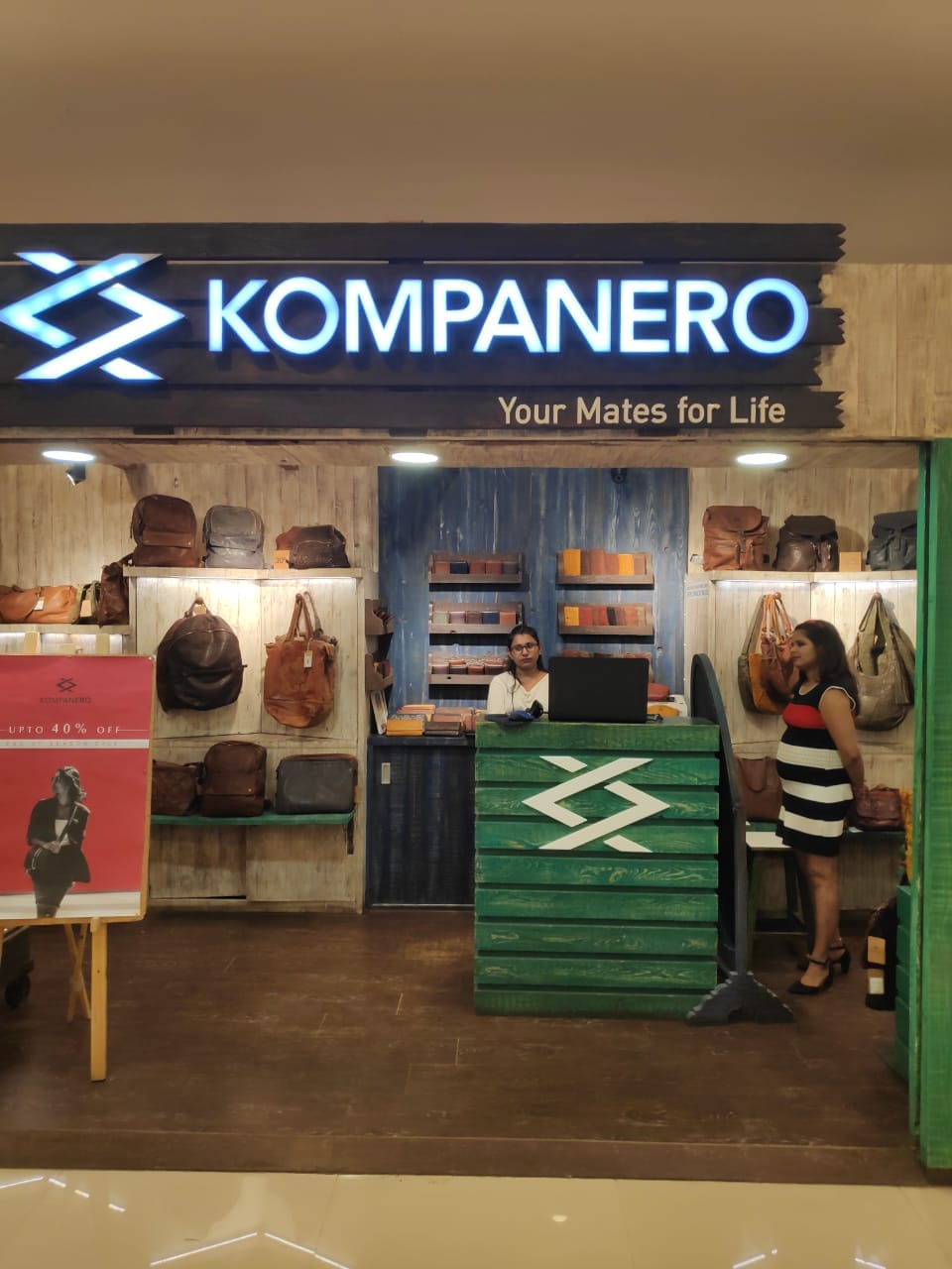 Outlet store,Building,Retail,Interior design,Signage