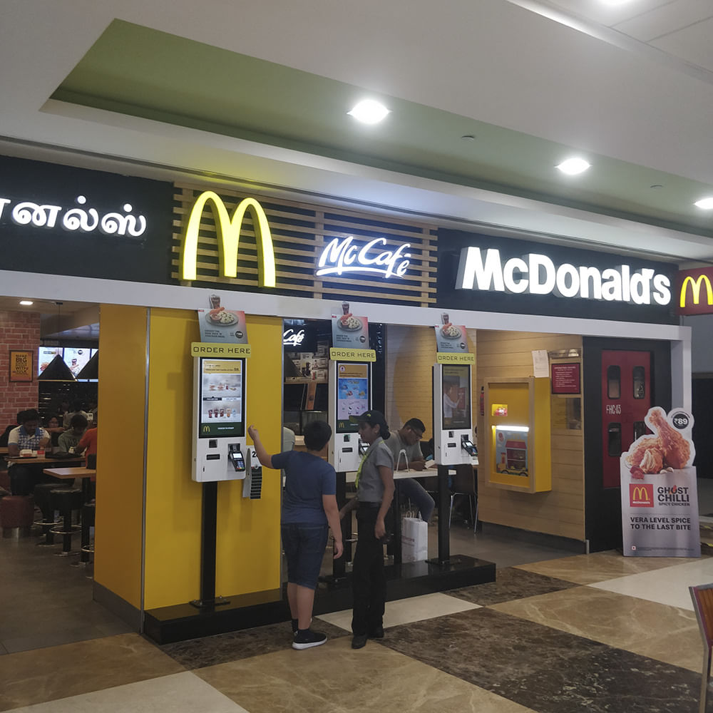 Building,Fast food restaurant,Shopping mall,Outlet store