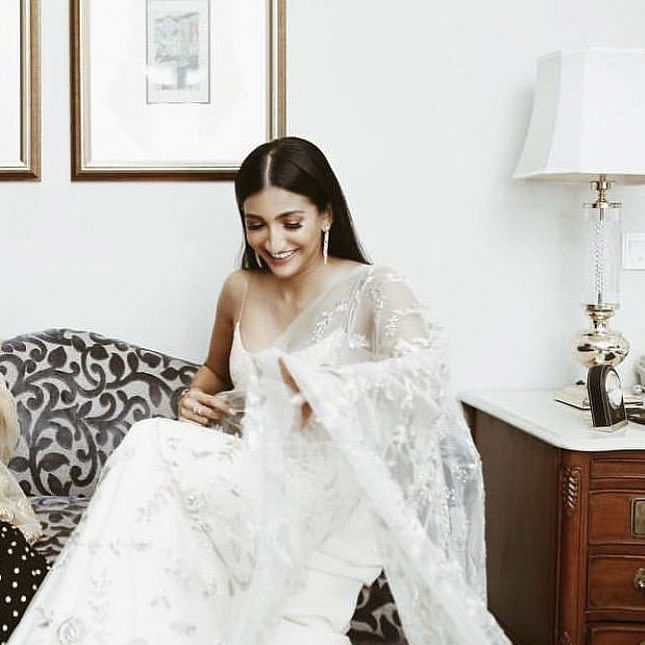 White,Wedding dress,Dress,Clothing,Photograph,Shoulder,Gown,Bridal clothing,Bride,Fashion