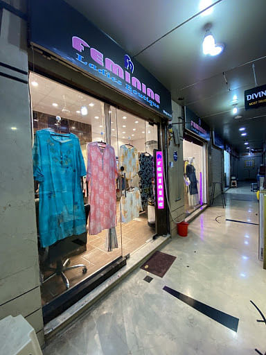 Boutique,Building,Outlet store,Interior design,Ceiling,Floor,Shopping mall,Sportswear,Flooring,Retail