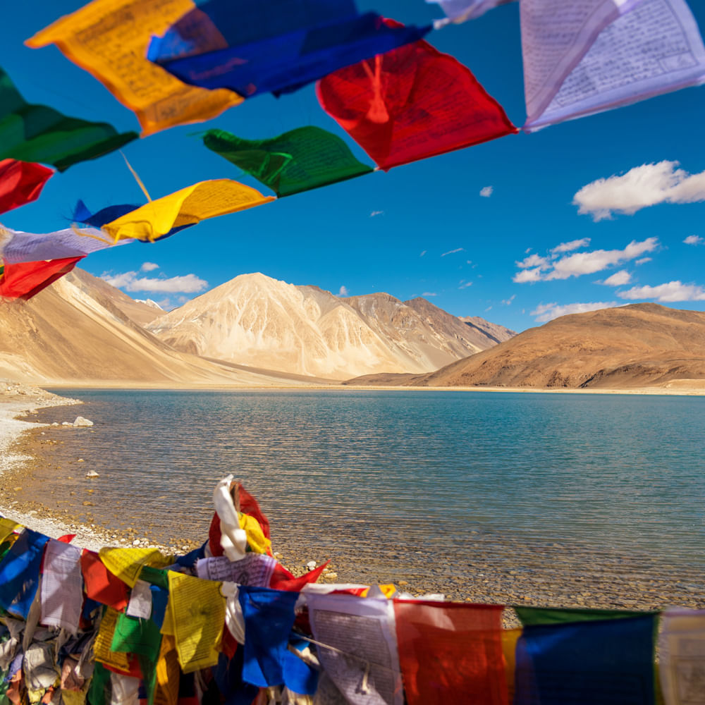 Sky,Umbrella,Mountain,Vacation,Summer,Colorfulness,Travel,Tourism,Tree,Landscape