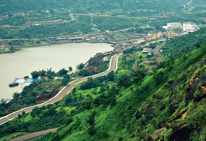 Water resources,Natural landscape,Water,Bird's-eye view,Aerial photography,Geological phenomenon,Hill station,River,Road,Waterway