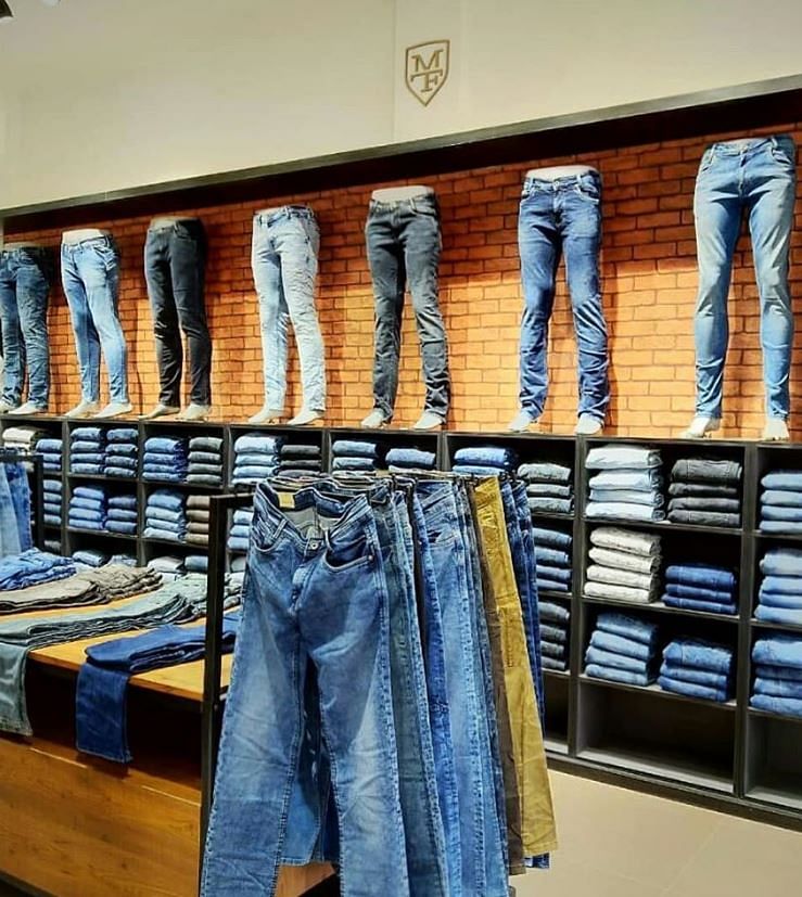 Jeans,Denim,Room,Textile,Footwear,Boutique,Shoe,Trousers,Clothes hanger,Closet