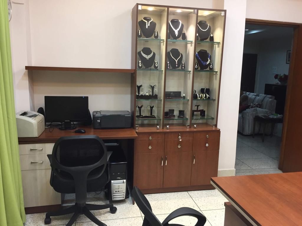 Furniture,Room,Property,Shelf,Eyewear,Building,Cabinetry,Shelving,Glasses,Interior design