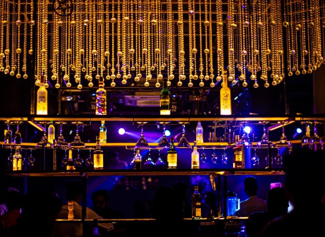 Lighting,Bar,Stage,Musical instrument accessory,Music venue,Night,Architecture,Event,Performance,Nightclub