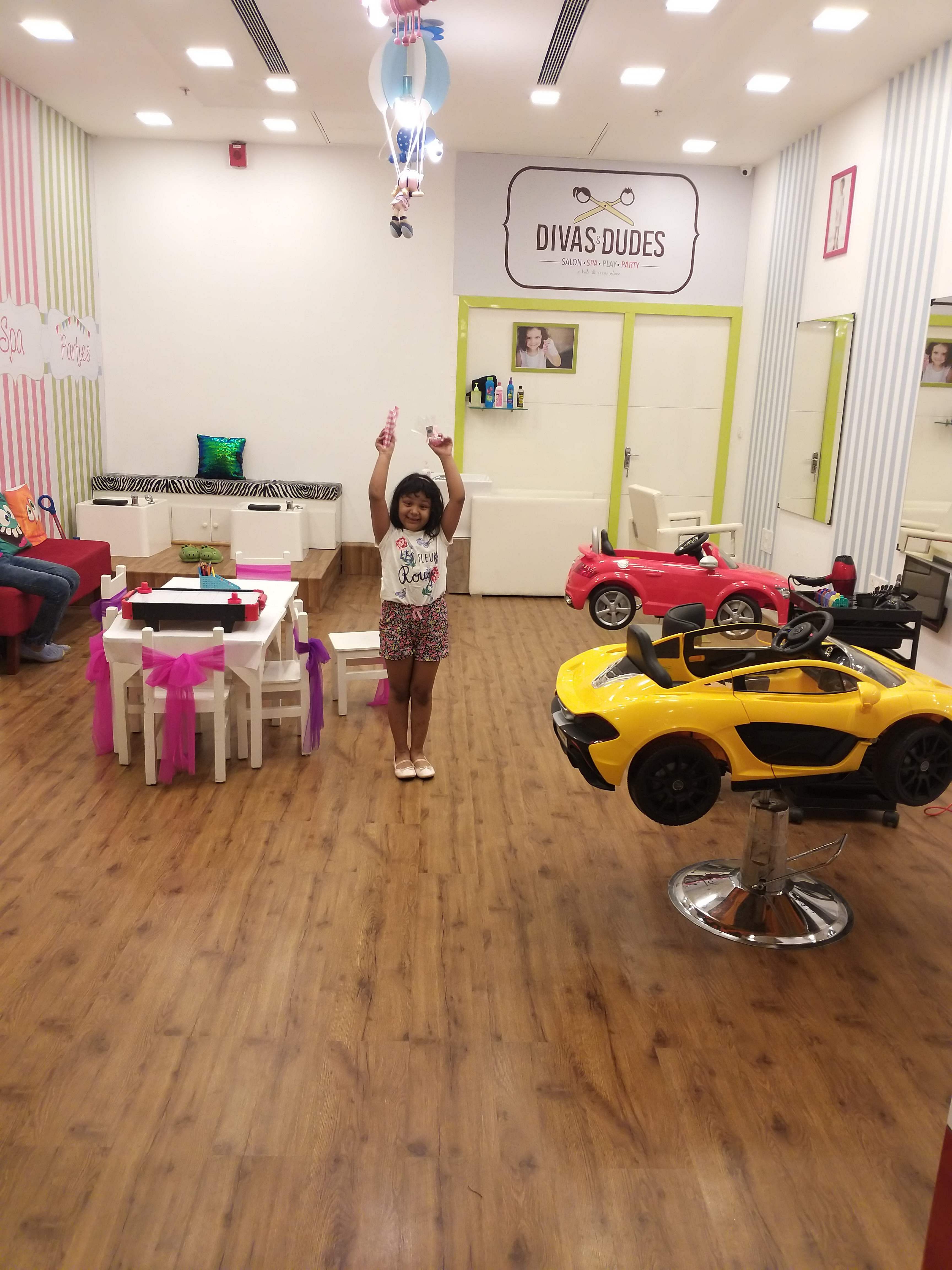 Floor,Room,Yellow,Flooring,Vehicle,Interior design,Design,Child,Building,Car