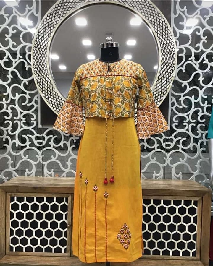 Clothing,Yellow,Dress,Formal wear,Pattern,Architecture,Pattern,Abaya,Style