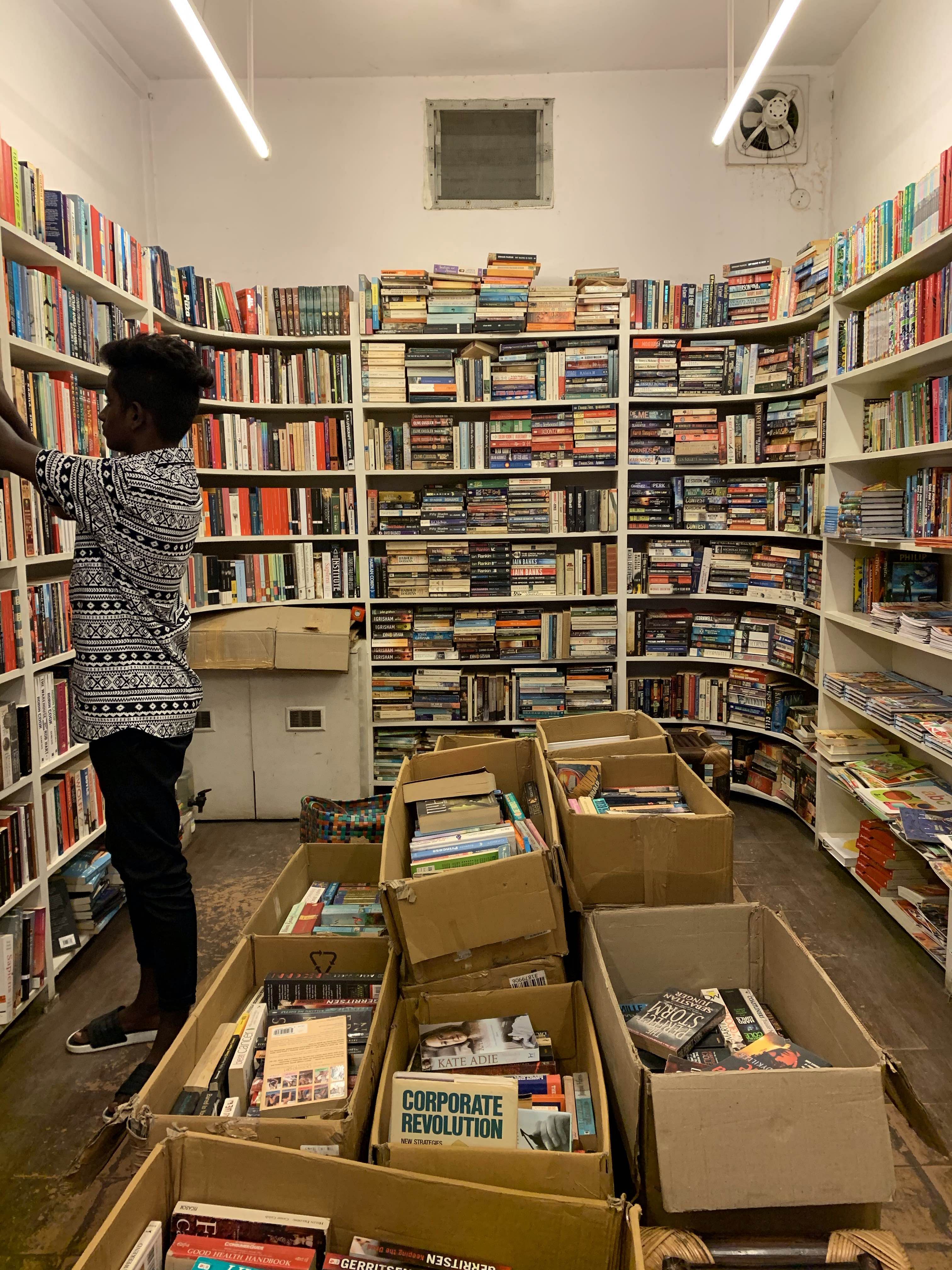 Bookselling,Retail,Public library,Building,Library,Bookcase,Shelving,Book,Shelf,Publication