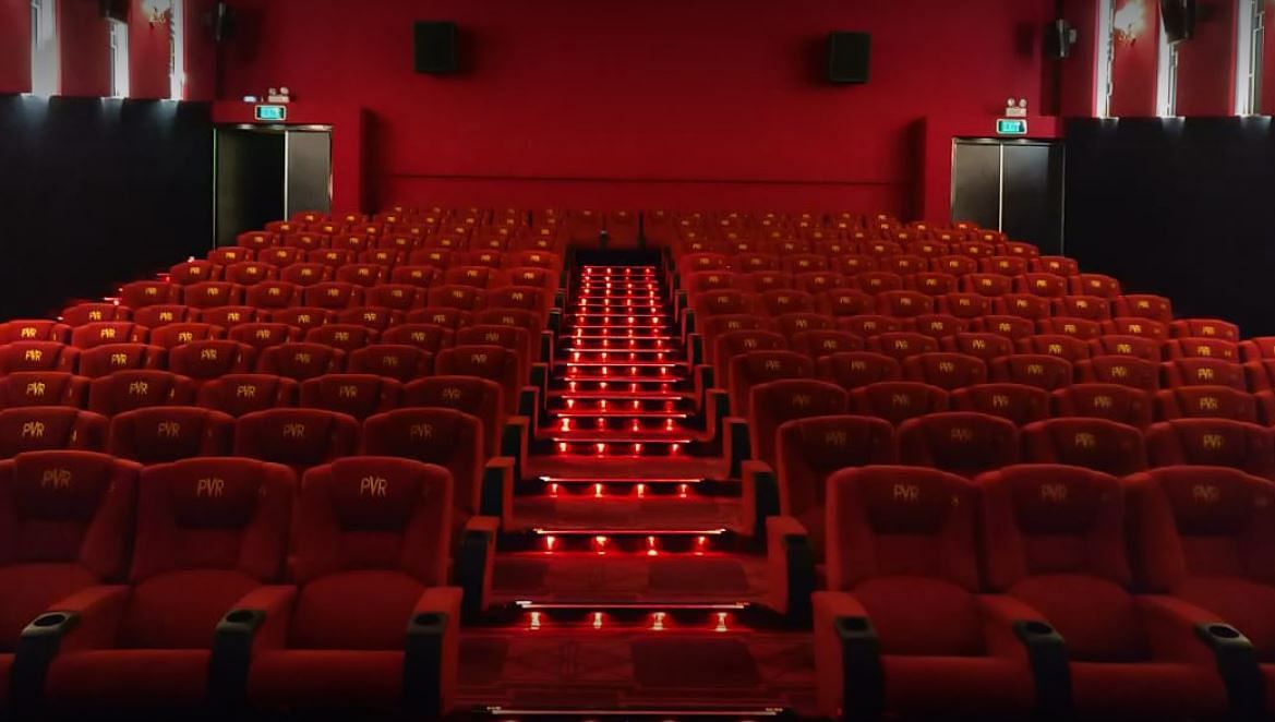 Auditorium,Theatre,Red,heater,Movie theater,Building,Movie palace,Performing arts center,Room,Concert hall