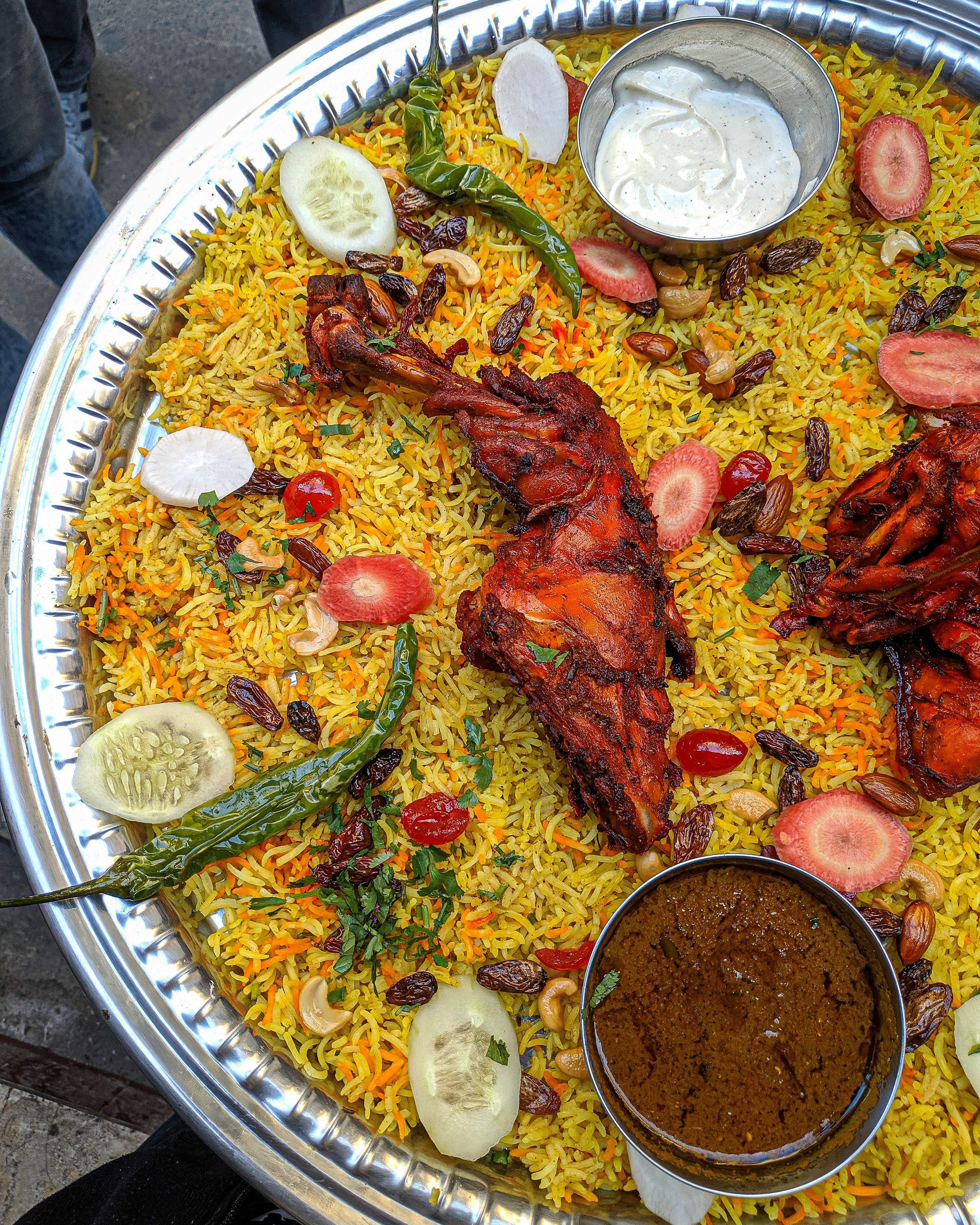 Dish,Cuisine,Food,Biryani,Kabsa,Ingredient,Mandi,Indian cuisine,Maqluba,Rice