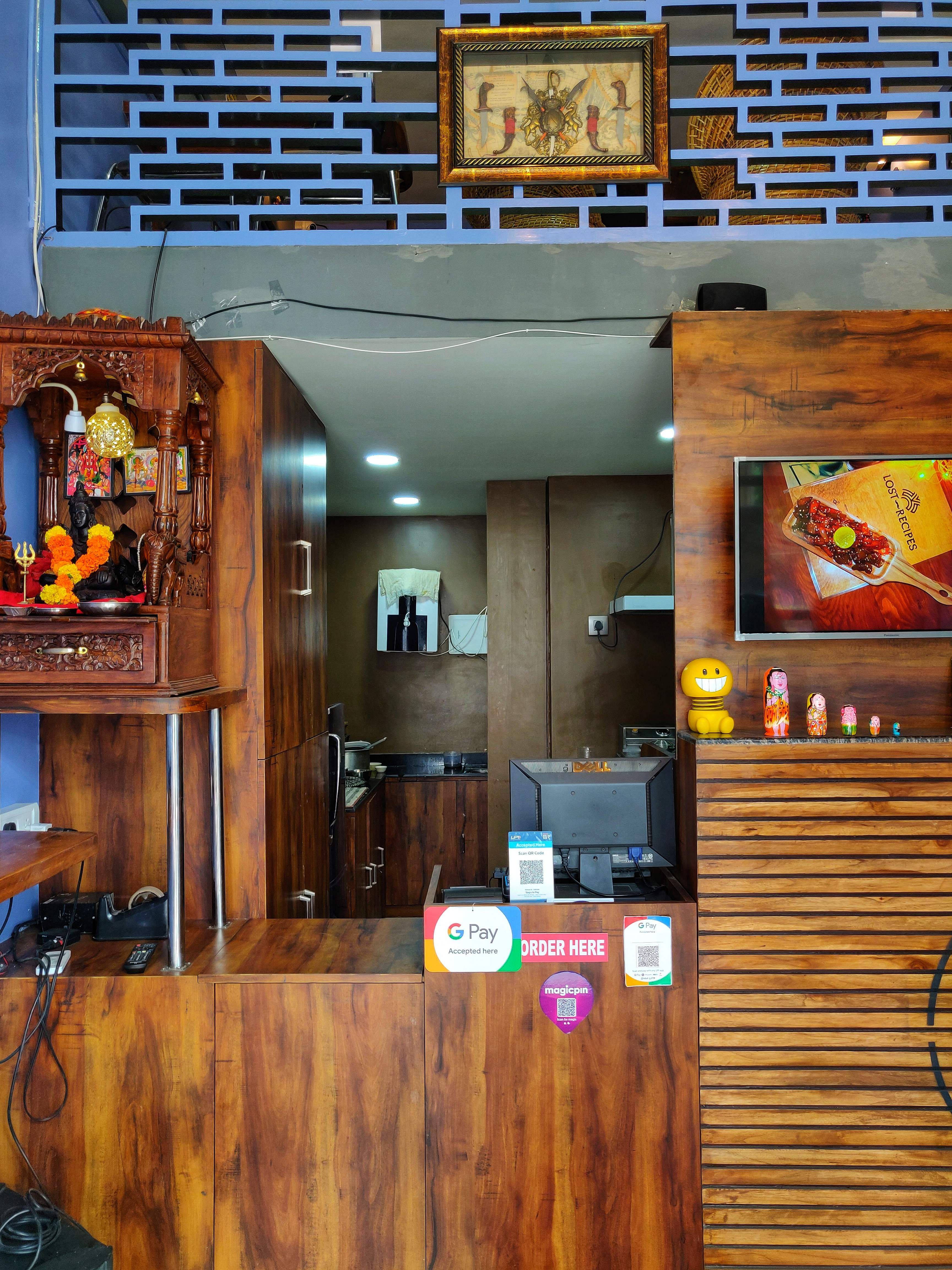 Room,Interior design,Restaurant,Building,Coffeehouse,Furniture,Café,Wood,Table,House