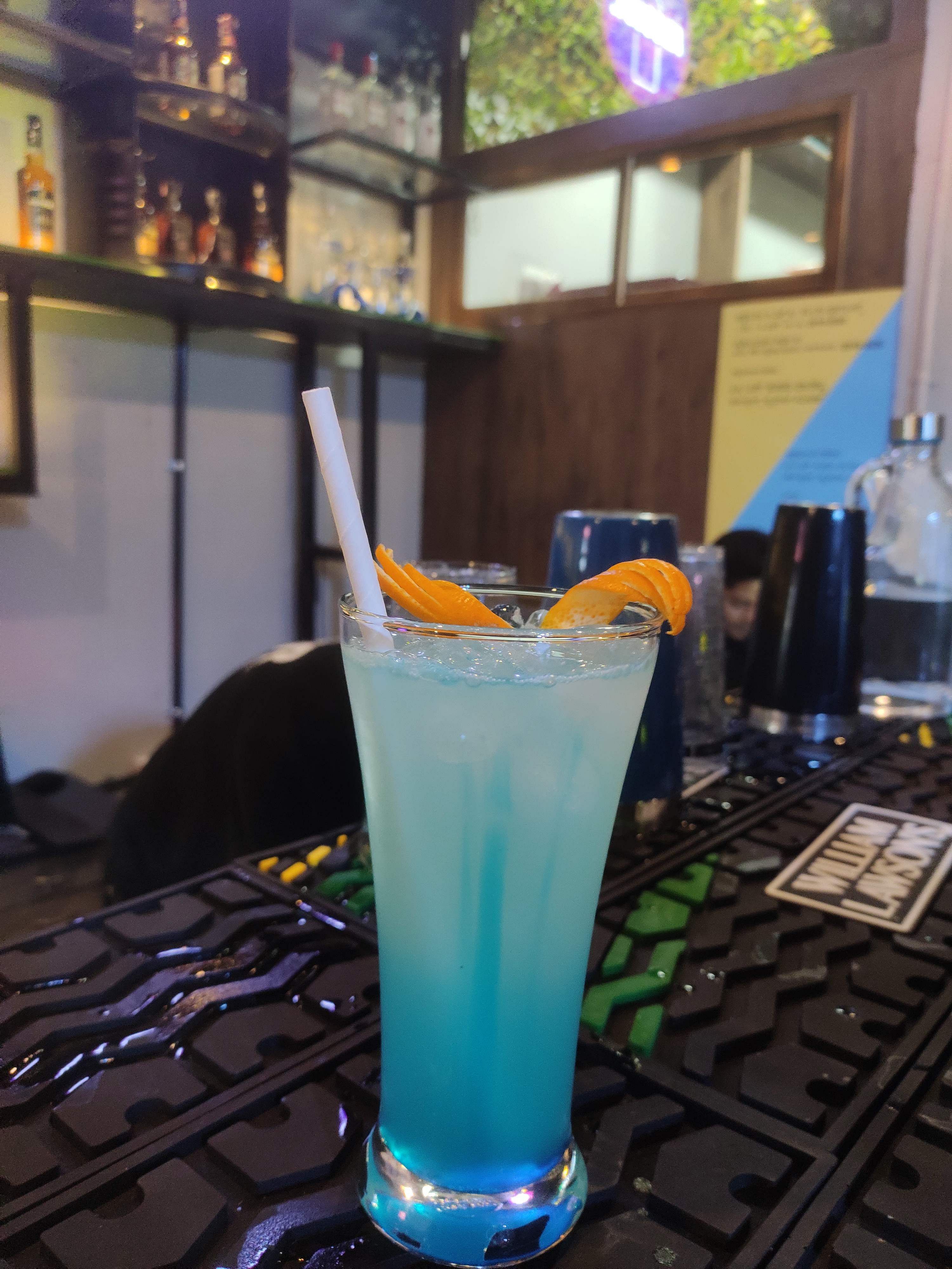 Drink,Non-alcoholic beverage,Alcoholic beverage,Blue lagoon,Distilled beverage,Blue hawaii,Rum swizzle,Cocktail,Cocktail garnish,Italian soda