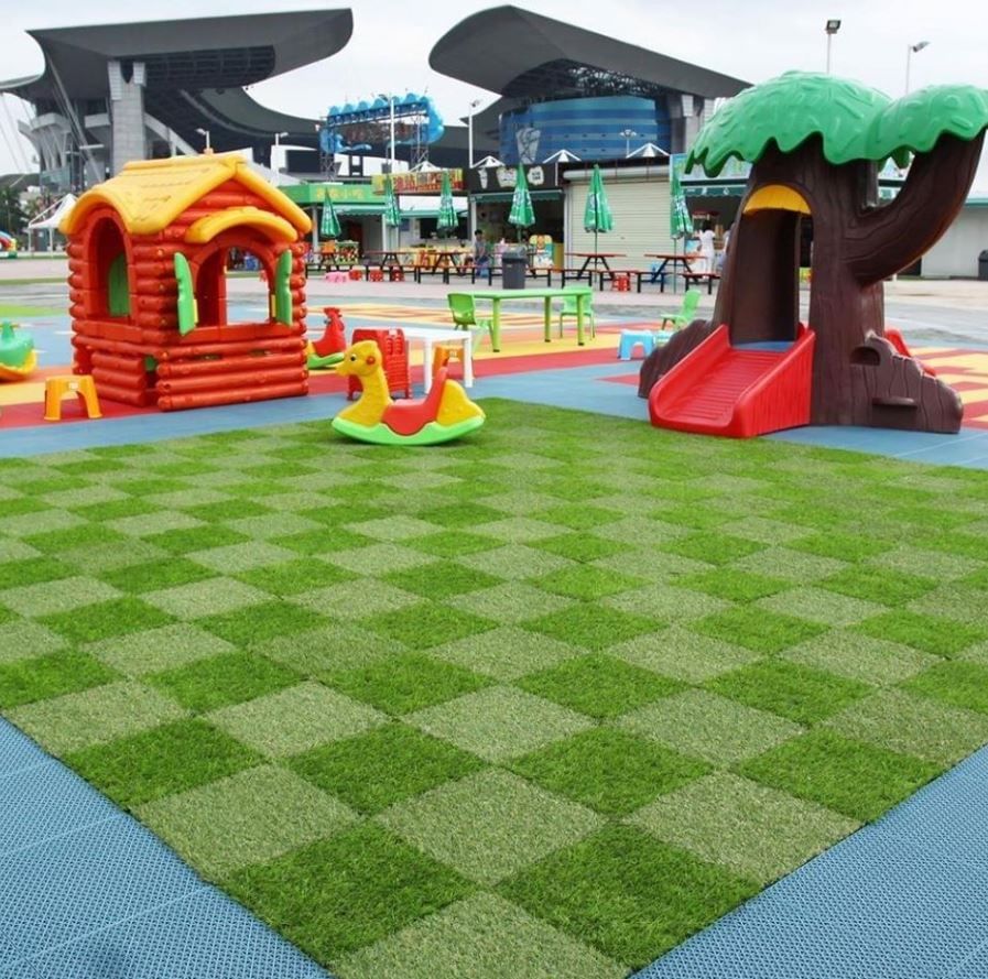 Grass,Playground,Public space,Outdoor play equipment,Human settlement,Artificial turf,Kindergarten,Leisure,Recreation,Flooring