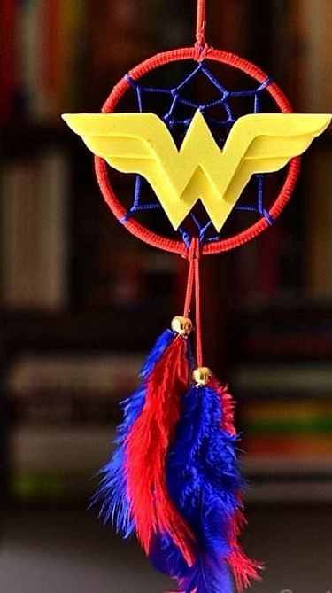 Feather,Electric blue,Piñata,Ornament,Fashion accessory