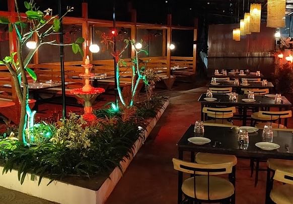 Lighting,Restaurant,Buffet,Houseplant,Interior design,Meal,Table,Plant,Building,Function hall